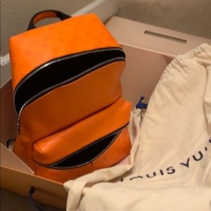 Louis Vuitton orange discovery backpack